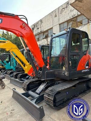 ใช้ Doosan DX60 เครื่องขุดขนาดเล็ก 6 ตัน พร้อมภาระหนักและเครื่องแข็ง